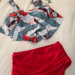 New swimsuit with tags. Adjustable straps